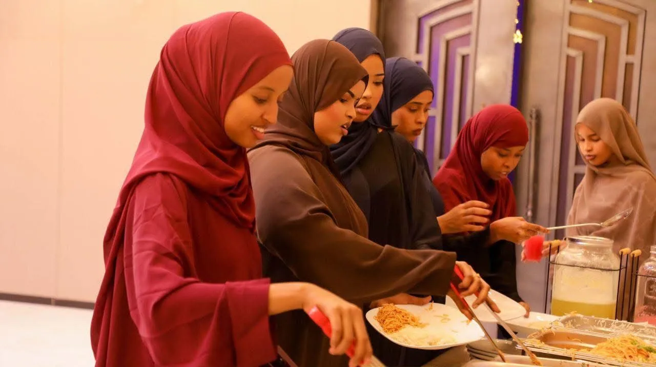 Women serving food at a community event